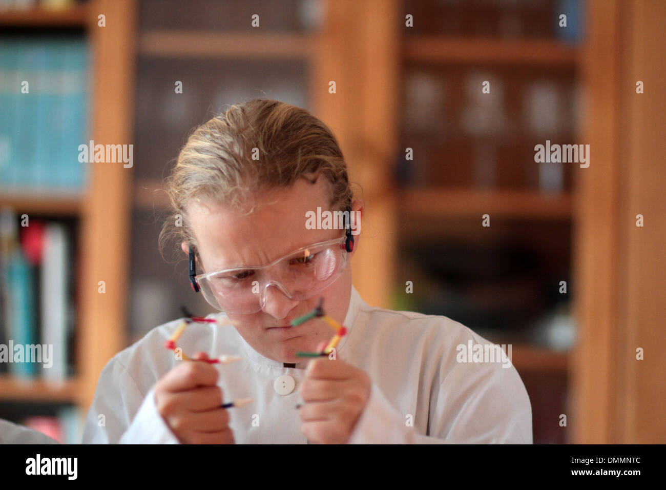 pupil girl learning about DNA genetics Stock Photo