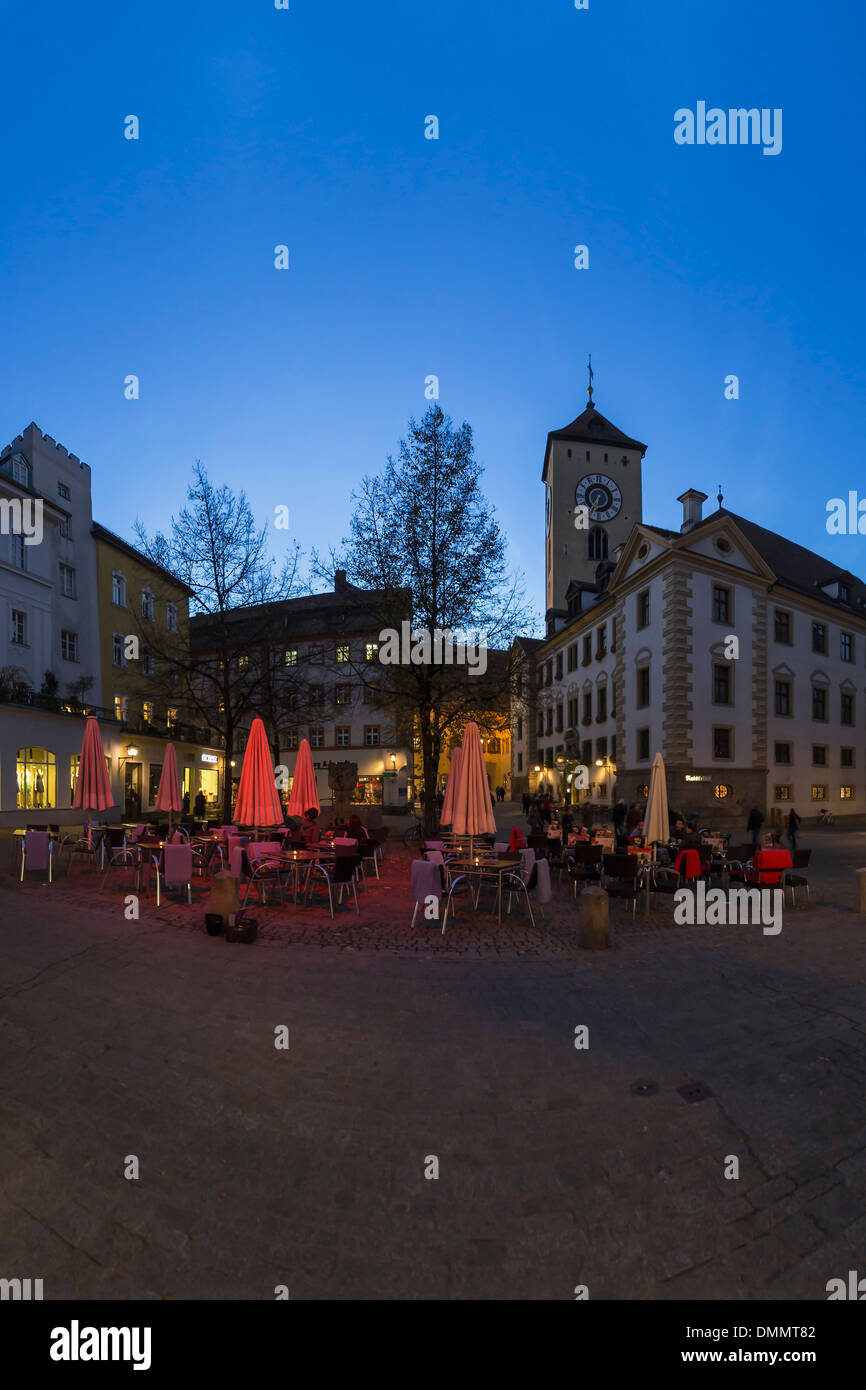 Germany, Bavaria, Regensburg, Kohlenmarkt with Sidewalk Cafe and Old Town Hall Stock Photo