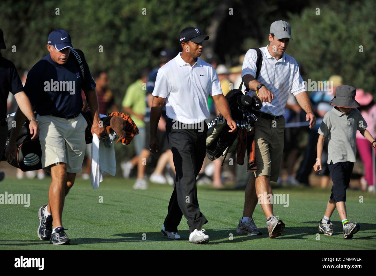 Nov 11, 2009 - Melbourne, Australia - (left to right) HANKY HANEY, TIGER WOODS, STUART GALE and SAM put the right foot forward down the fourth fairway during the Pro-AM at Kingston Heath Golf Club. (Credit Image: Â© Matthew Mallett/ZUMA Press) Stock Photo