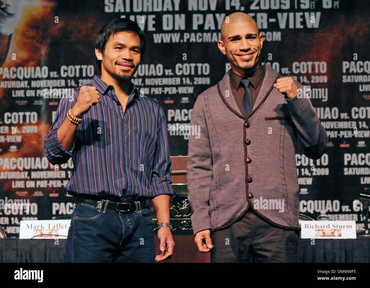 Nov 11, 2009 - Las Vegas, Nevada, USA - Boxers MANNY PACQUIAO, left, and MIGUEL COTTO stand off during the final news conference at the MGM Grand before their WBO welterweight championship bout  on Saturday, Nov. 14, 2009 at the MGM Grand Garden Arena. (Credit Image: © David Becker/ZUMApress.com) Stock Photo