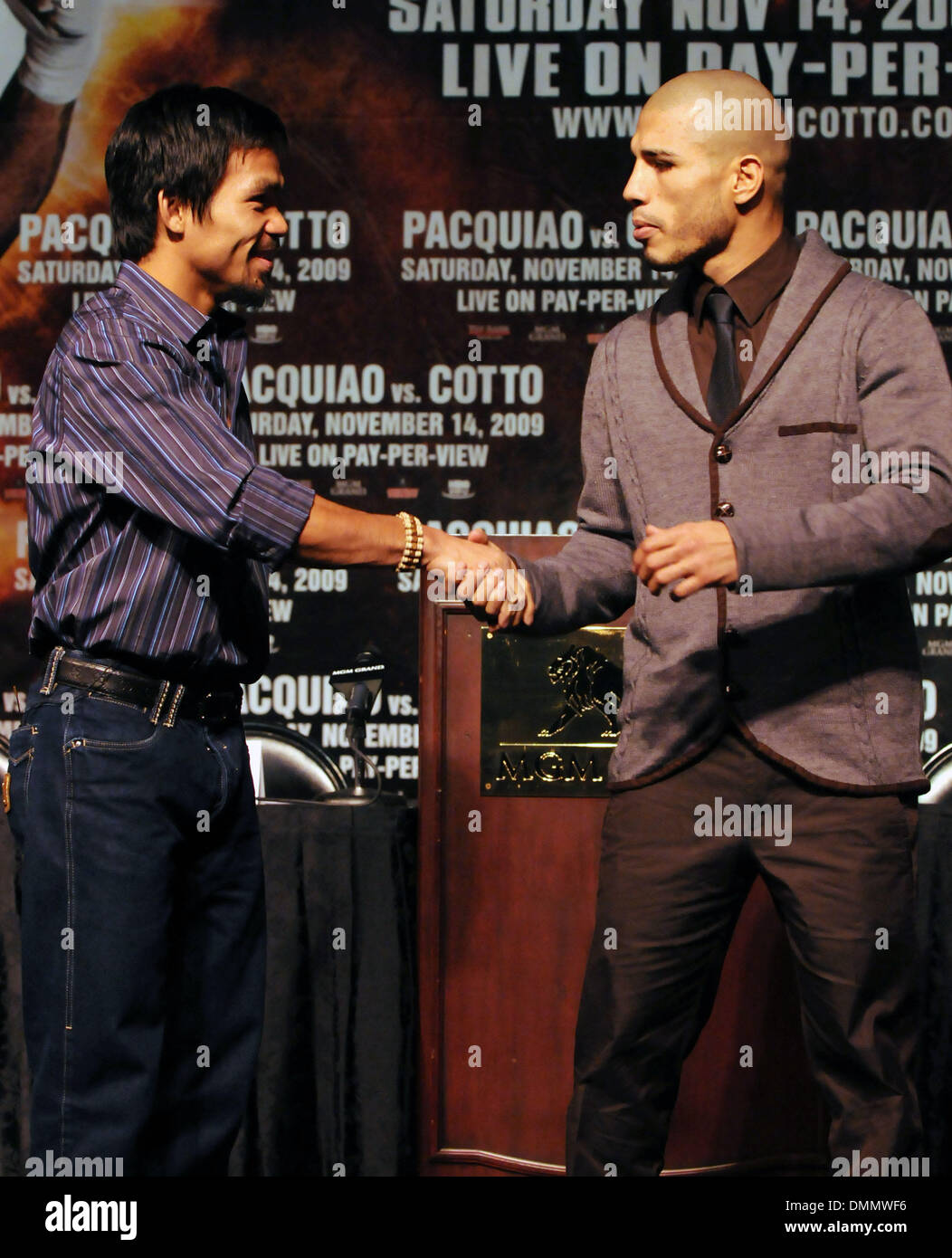 Nov 11, 2009 - Las Vegas, Nevada, USA - Boxers MANNY PACQUIAO, left, and MIGUEL COTTO stand off during the final news conference at the MGM Grand before their WBO welterweight championship bout  on Saturday, Nov. 14, 2009 at the MGM Grand Garden Arena. (Credit Image: © David Becker/ZUMApress.com) Stock Photo