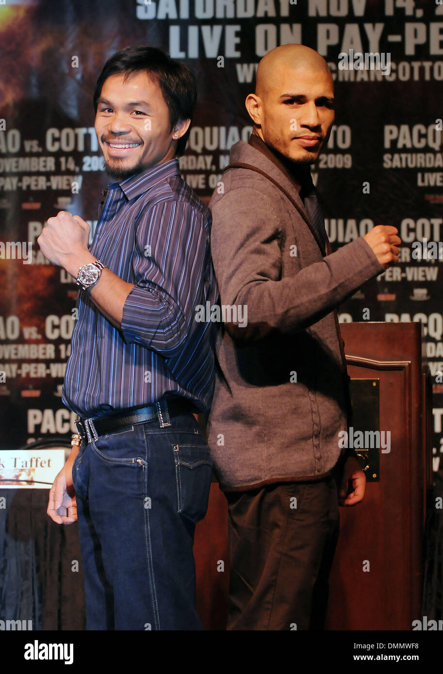 Nov 11, 2009 - Las Vegas, Nevada, USA - Boxers MANNY PACQUIAO, left, and MIGUEL COTTO stand off during the final news conference at the MGM Grand before their WBO welterweight championship bout  on Saturday, Nov. 14, 2009 at the MGM Grand Garden Arena. (Credit Image: © David Becker/ZUMApress.com) Stock Photo