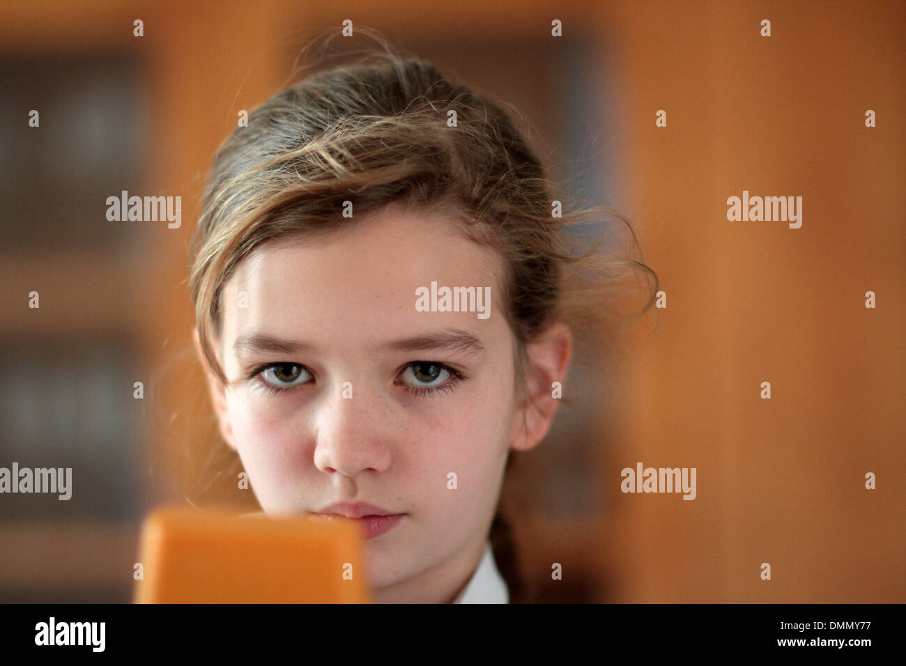 girl working with a electrical device Stock Photo