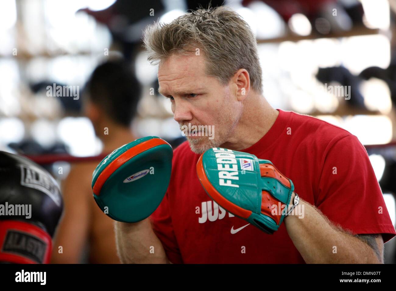 Nov 06, 2009 - Hollywood, California, USA - FREDDIE ROACH, 2008 Trainer of  the Year, works the mitts with a fighter inside the Wild Card Boxing Club  in Hollywood California. (Credit Image: