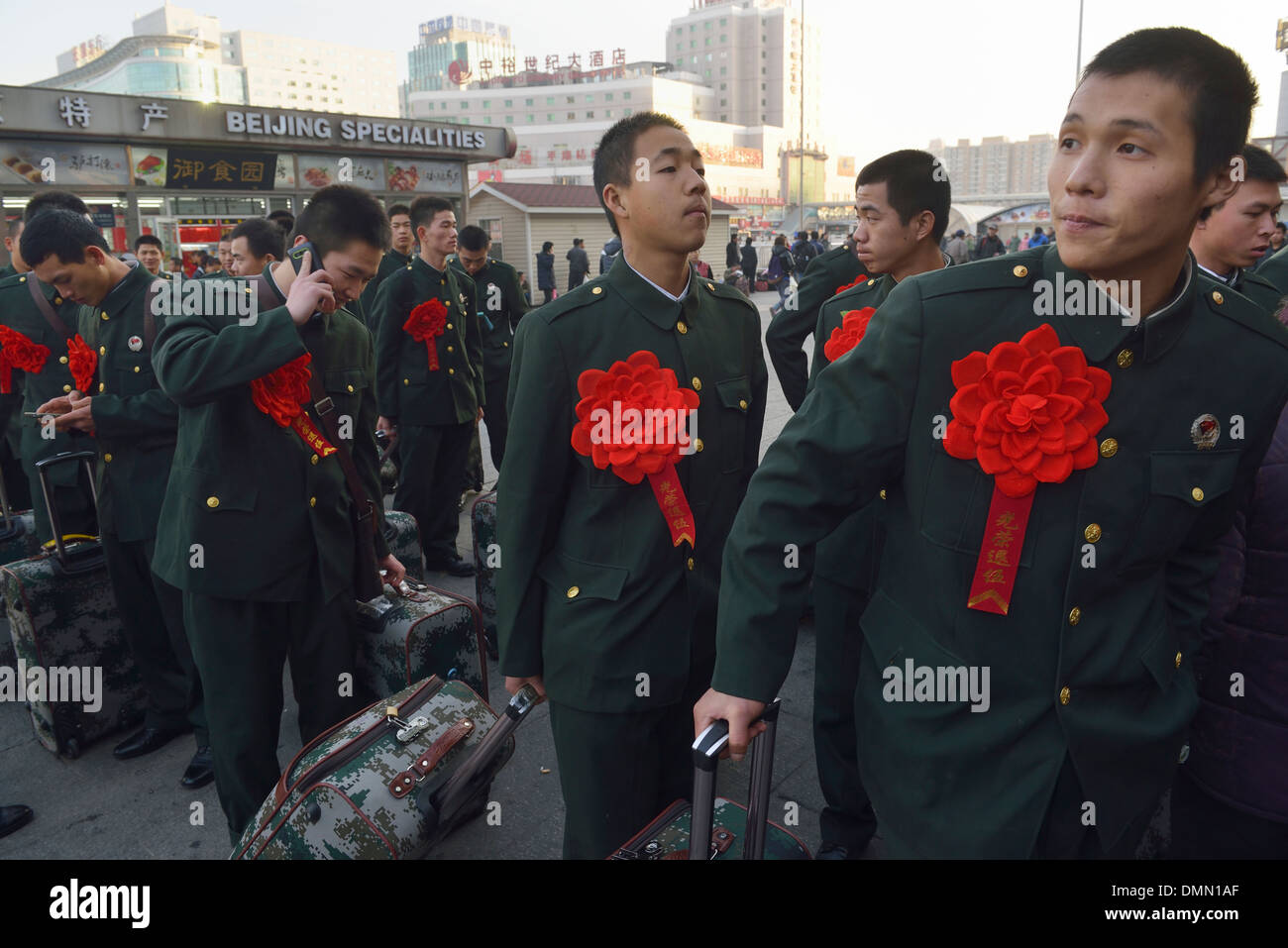 Chinese Demobilized Soldiers Wait To Take The Train At A Railway