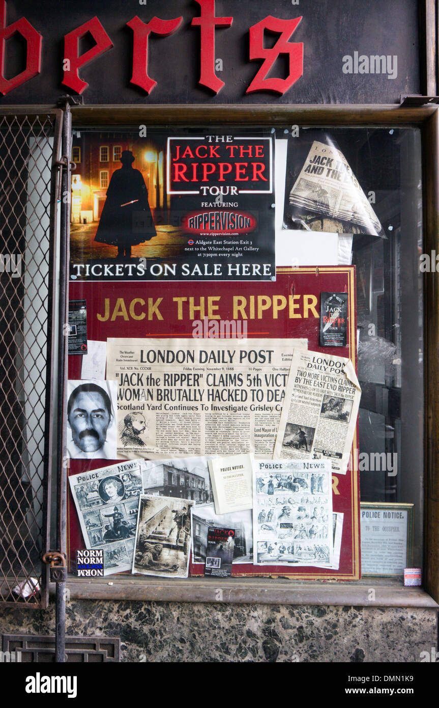 Poster for a Jack the Ripper tour in a window in a Whitechapel alleyway. Stock Photo