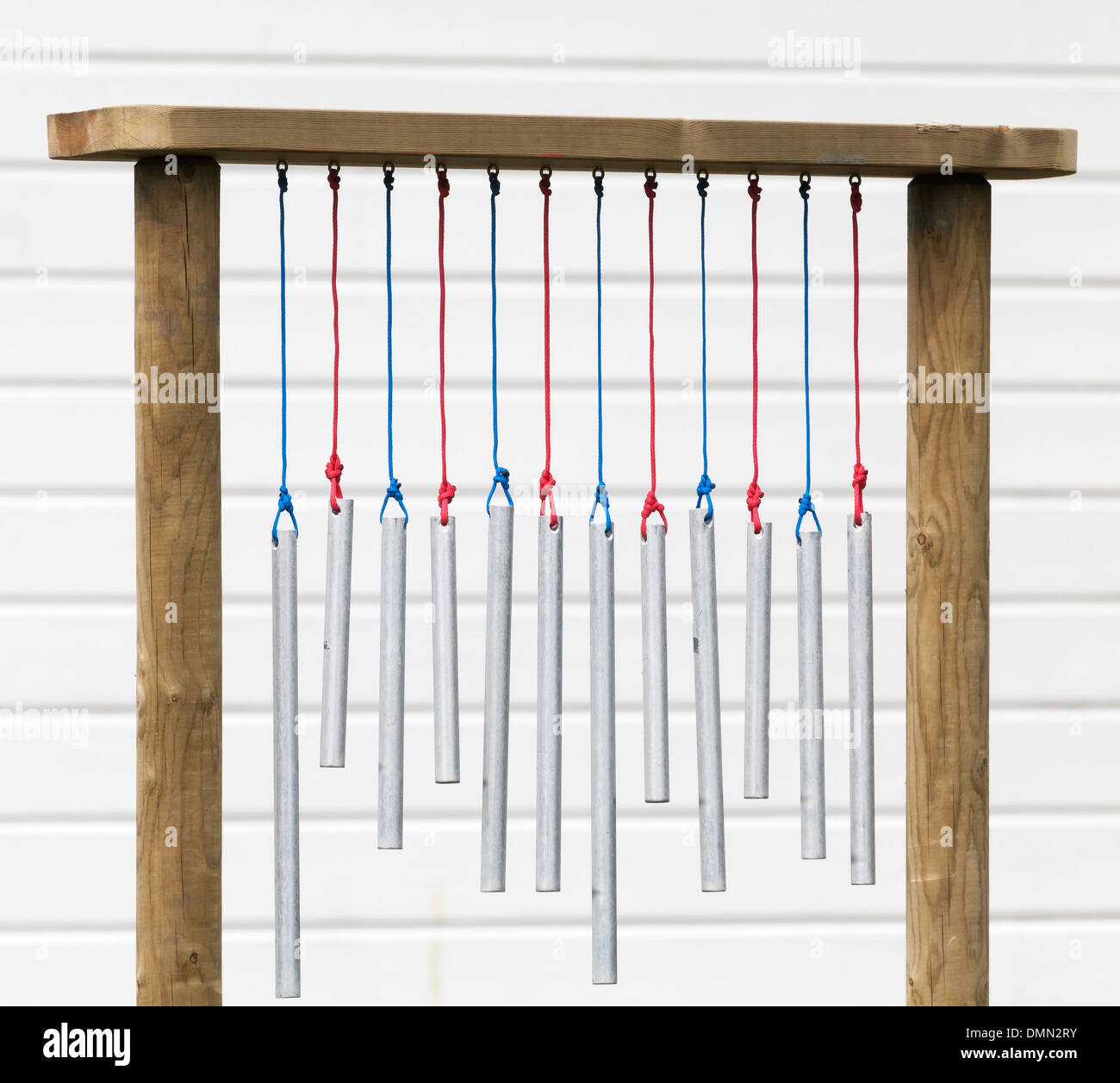 Outdoor glockenspiel toy with hanging metal tubes Stock Photo