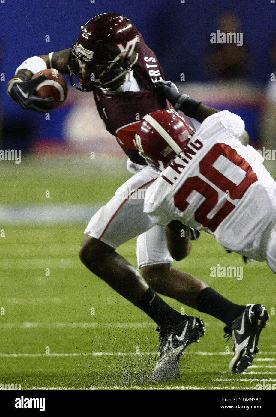 Sep 05, 2009 - Atlanta, Georgia, USA - NCAA Football - Virginia Tech's DYRELL ROBERTS, left, fights off Alabama's TYRONE KING (20) during the first half of the schools' game in the Georgia Dome (Credit Image: © Josh D. Weiss/ZUMA Press) Stock Photo