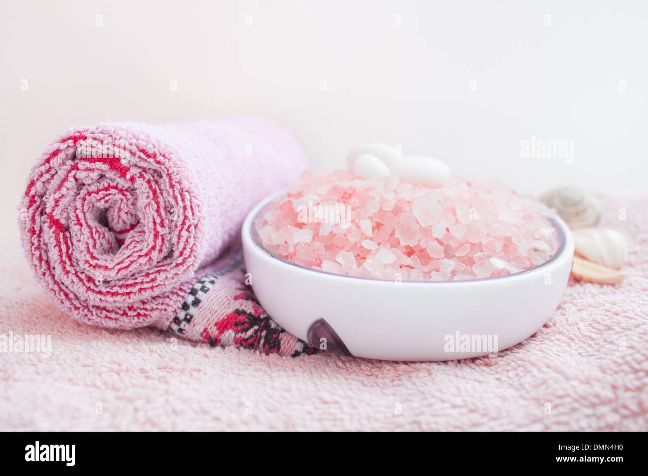 pink "bath salt"  towel spa therapy aromatherapy "bath salt crystals" Stock Photo