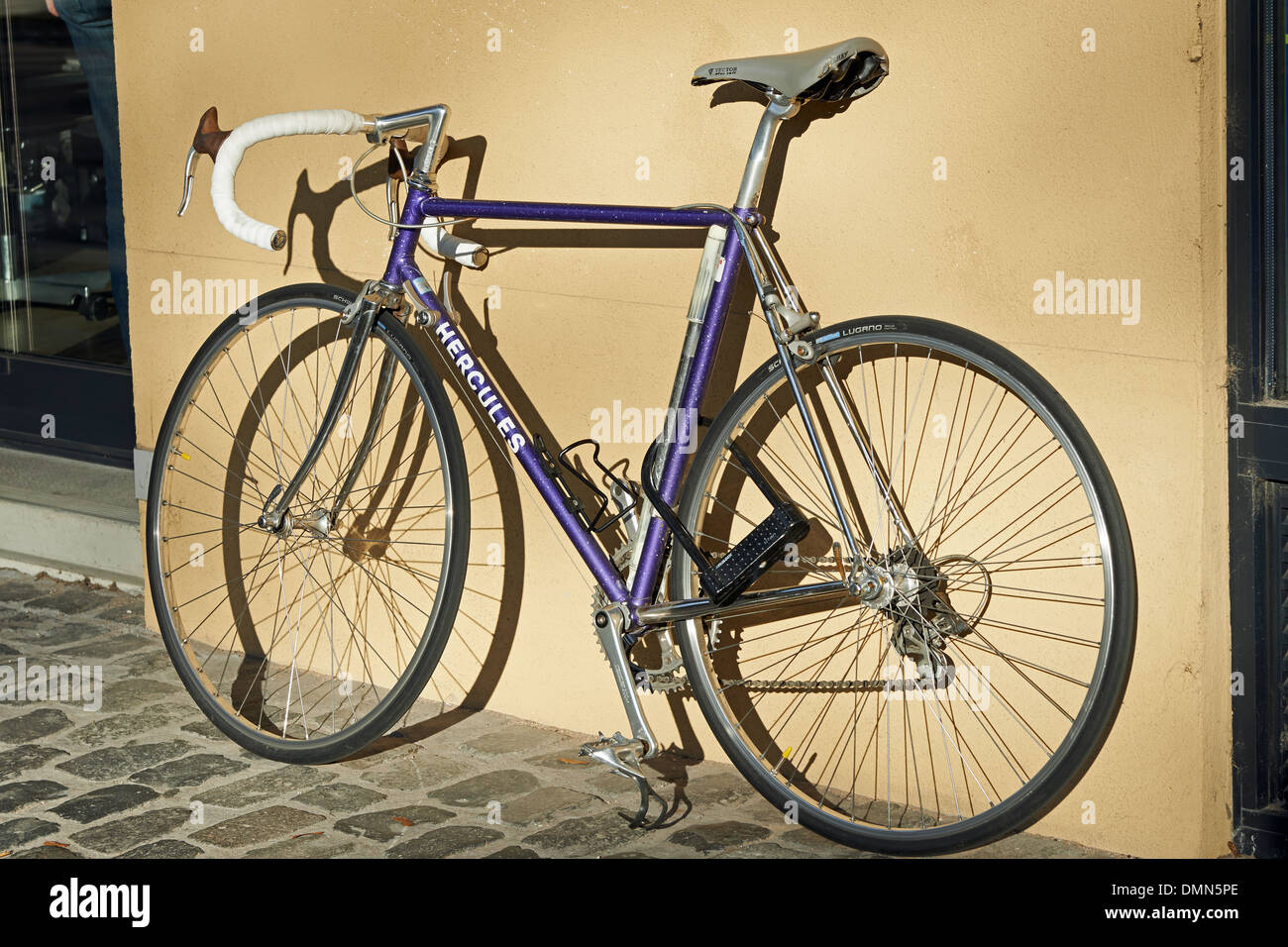 Racing bicycle parked with lock Stock Photo