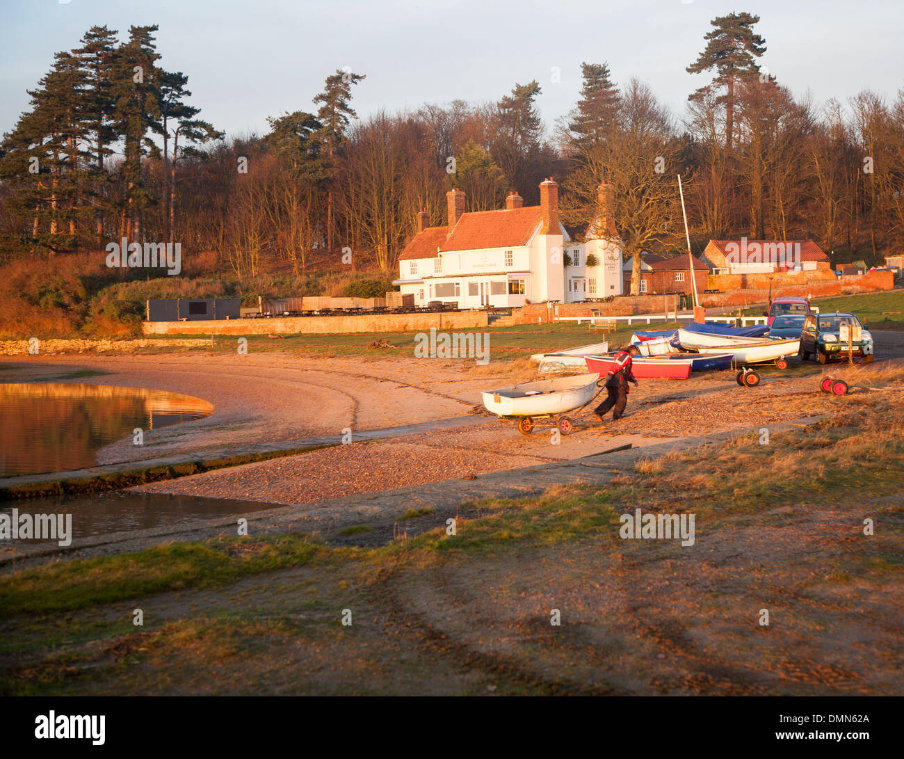 Boats by River Deben and Ramsholt Arms pub Suffolk England Stock Photo ...