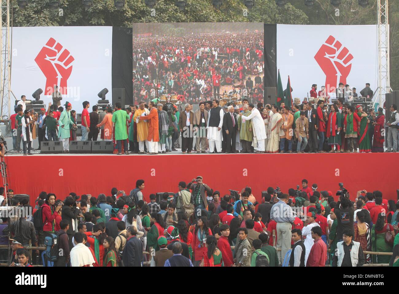 Dhaka, Bangladesh. 16th Dec, 2013. Tens of thousands of people have joined in singing Bangladesh's national anthem 'Amar sonar Bangla ami tomay bhalobasi' (My Bengal of Gold, I love you) at the Suhrawardy Udyan where the Bangalees' charter of freedom was written 42 years ago. Bangladesh won independence from Pakistan after a bitter nine-month war in 1971 led by the country's founder Sheikh Mujibur Rahman, and this is celebrated every year on December 16. Credit:  Monirul Alam/ZUMAPRESS.com/Alamy Live News Stock Photo