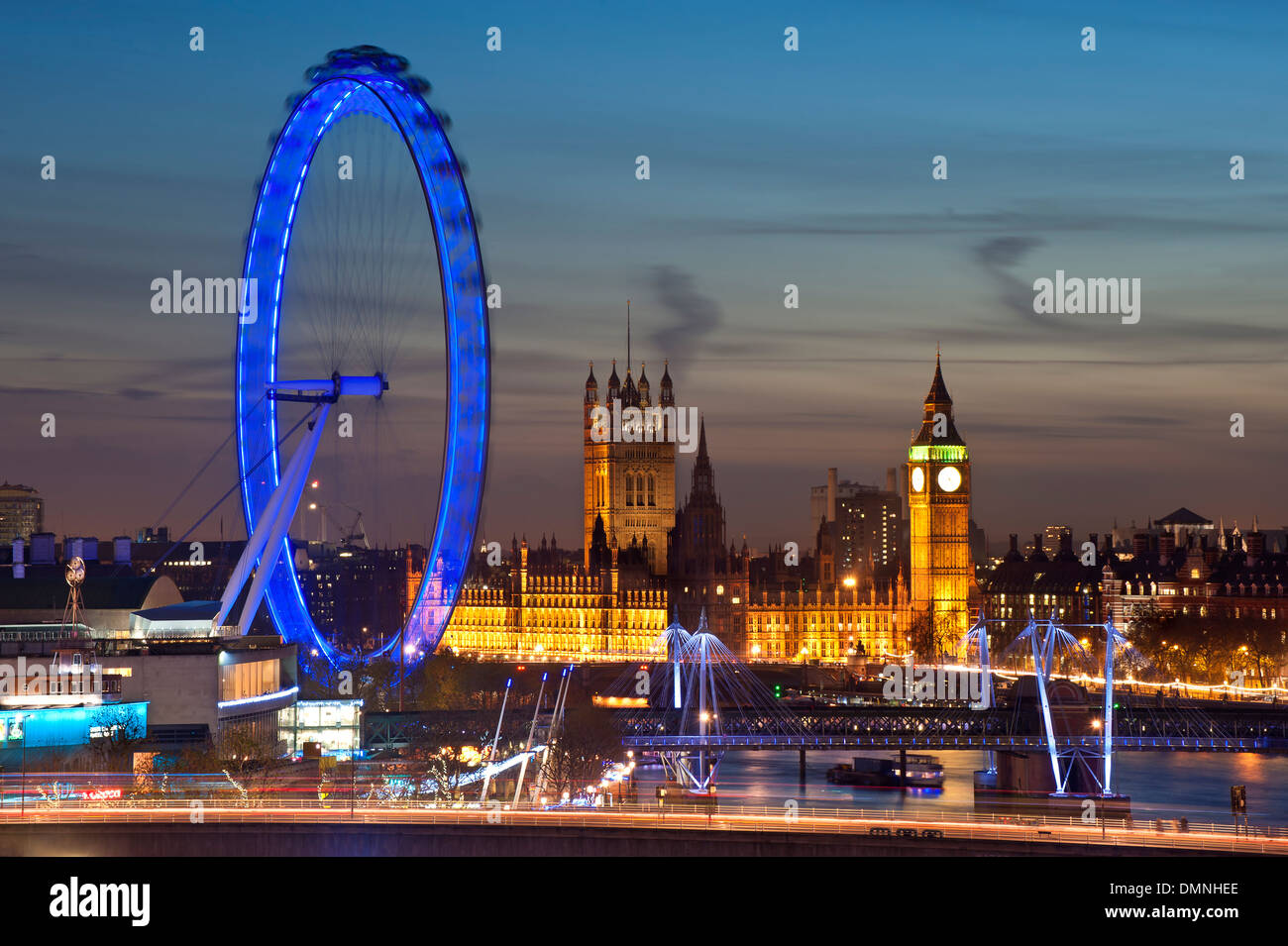 Houses of Parliament, Big Ben and London Eye night skyline Stock Photo