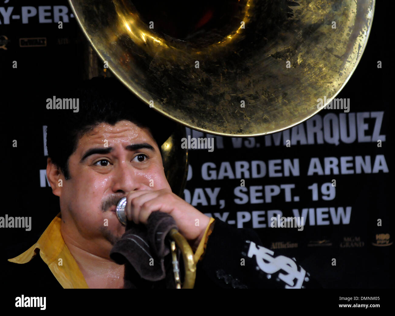 Sep 16, 2009 - Las Vegas, Nevada, USA - JESUS GARCIA, tuba player with the Mexican band El Moreno Carrillo Tierra Sagrada blows his horn before the news conference at the MGM Grand Hotel/Casino on Wednesday. The band entertained member of the media before Floyd Mayweather Jr. and Juan Manuel Marquez entered the room. (Credit Image: © David Becker/ZUMA Press) Stock Photo