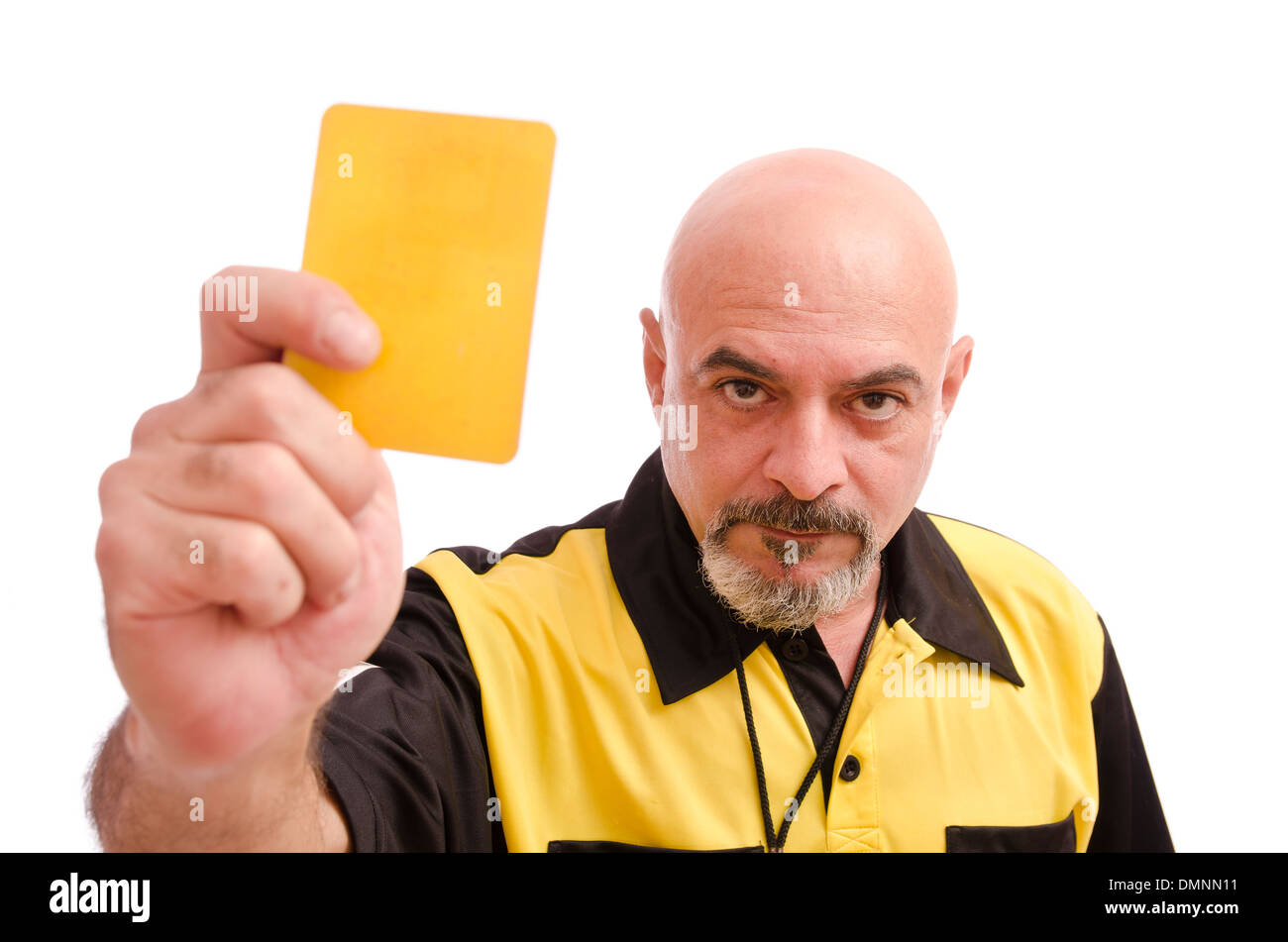 Referee show yellow card to the view Stock Photo
