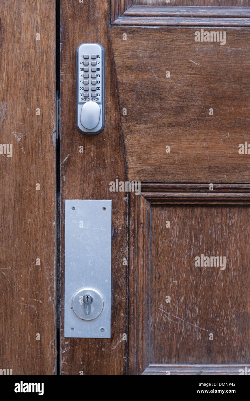 Door with a code lock or keypad for security, England, UK Stock Photo