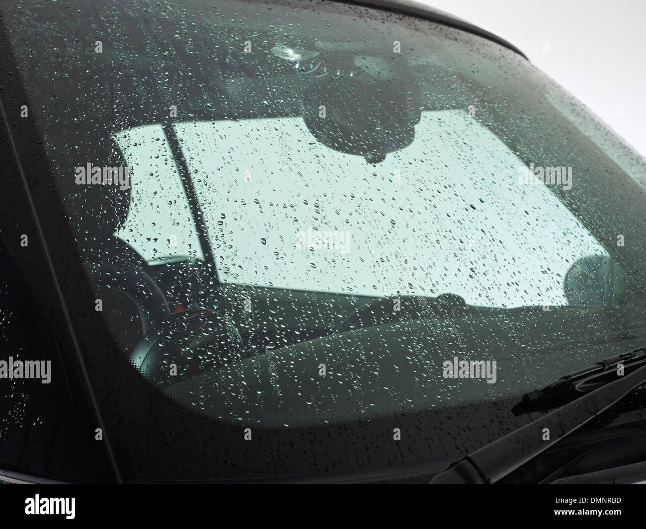 windscreen car wet water wash drops droplets rain wipers Stock Photo