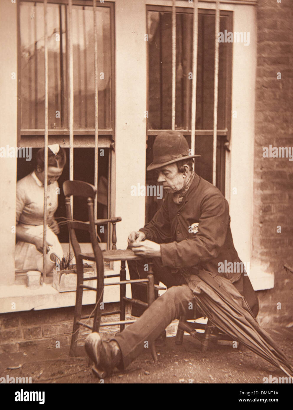 Photograph showing ''Carey' the clown' in the Street Life in London book Stock Photo