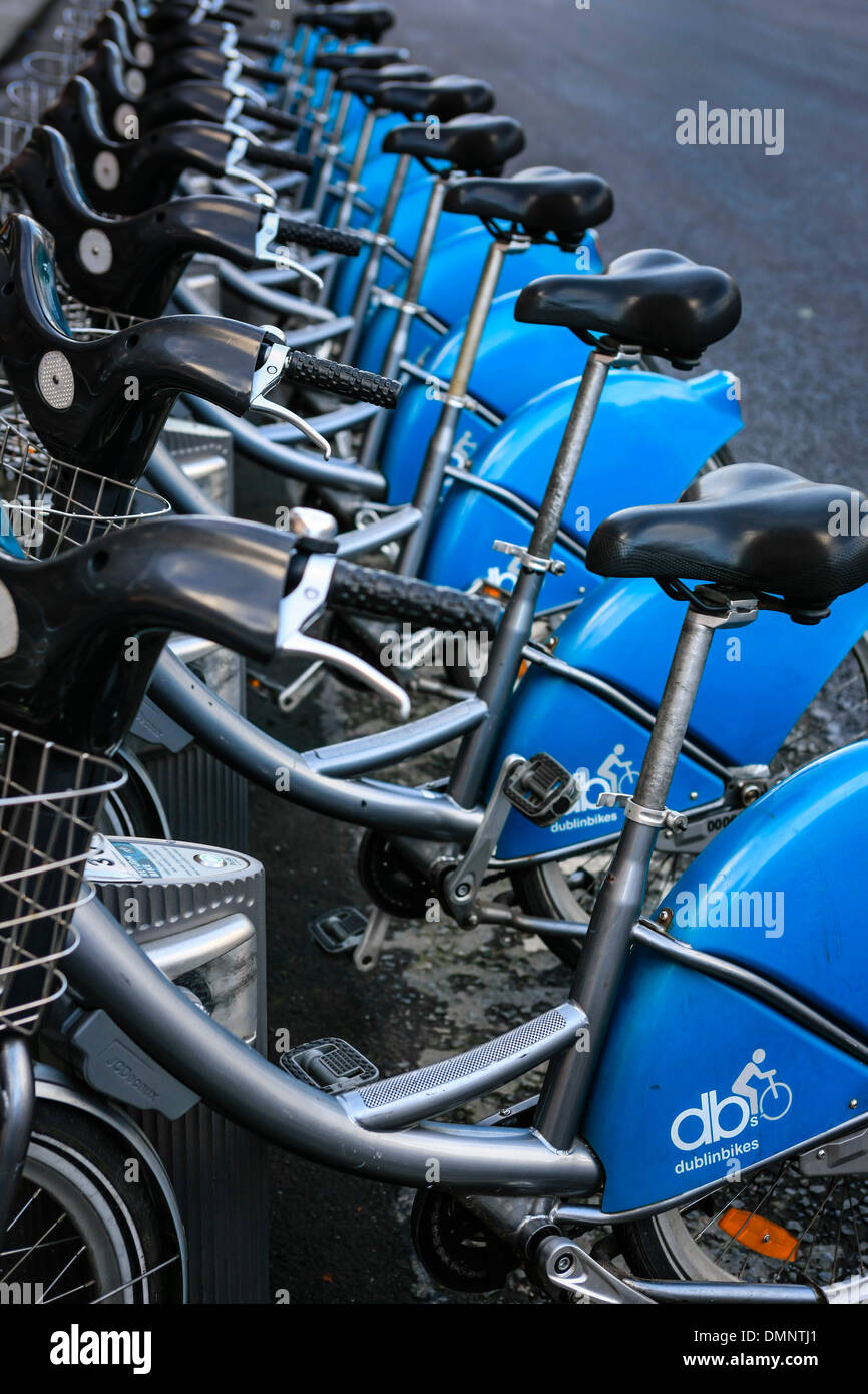 Blue Bicycles for hire for tourists in Dublin, a great way to get around and eco-friendly Stock Photo