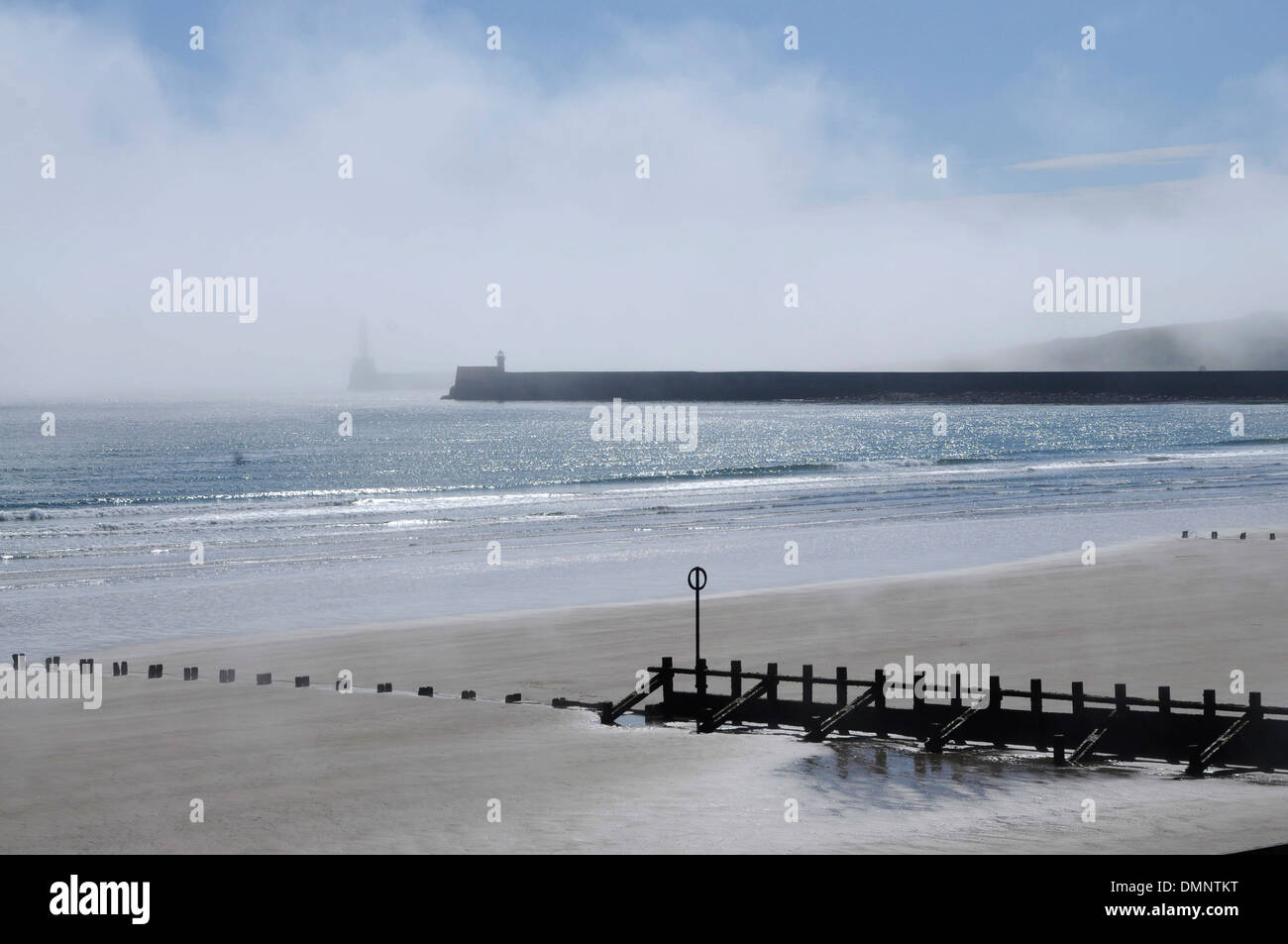 groynes erosion aberdeen  beach sand haar mist Stock Photo