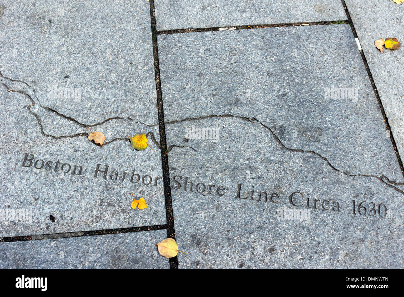 Pavement markings showing Boston Harbour Shore Line in 1630 Boston, Massachusetts, USA Stock Photo