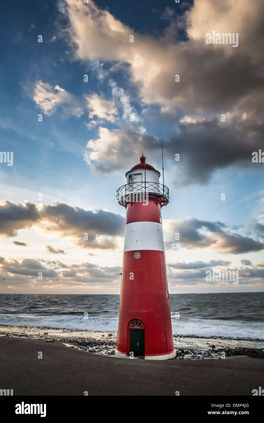 Netherlands, Westkapelle, Lighthouse on dyke Stock Photo