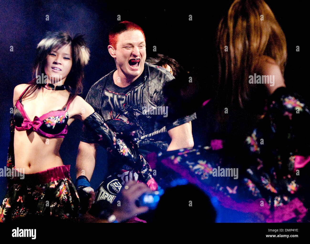 Nov. 12, 2009 - Hoffman Estates, Illinois, U.S - 07 November 2009: Jason '' Mayhem'' Miller makes his way down the entrance ramp flanked by asian  theamed dancers prior to his fight at, image size:1300x1024