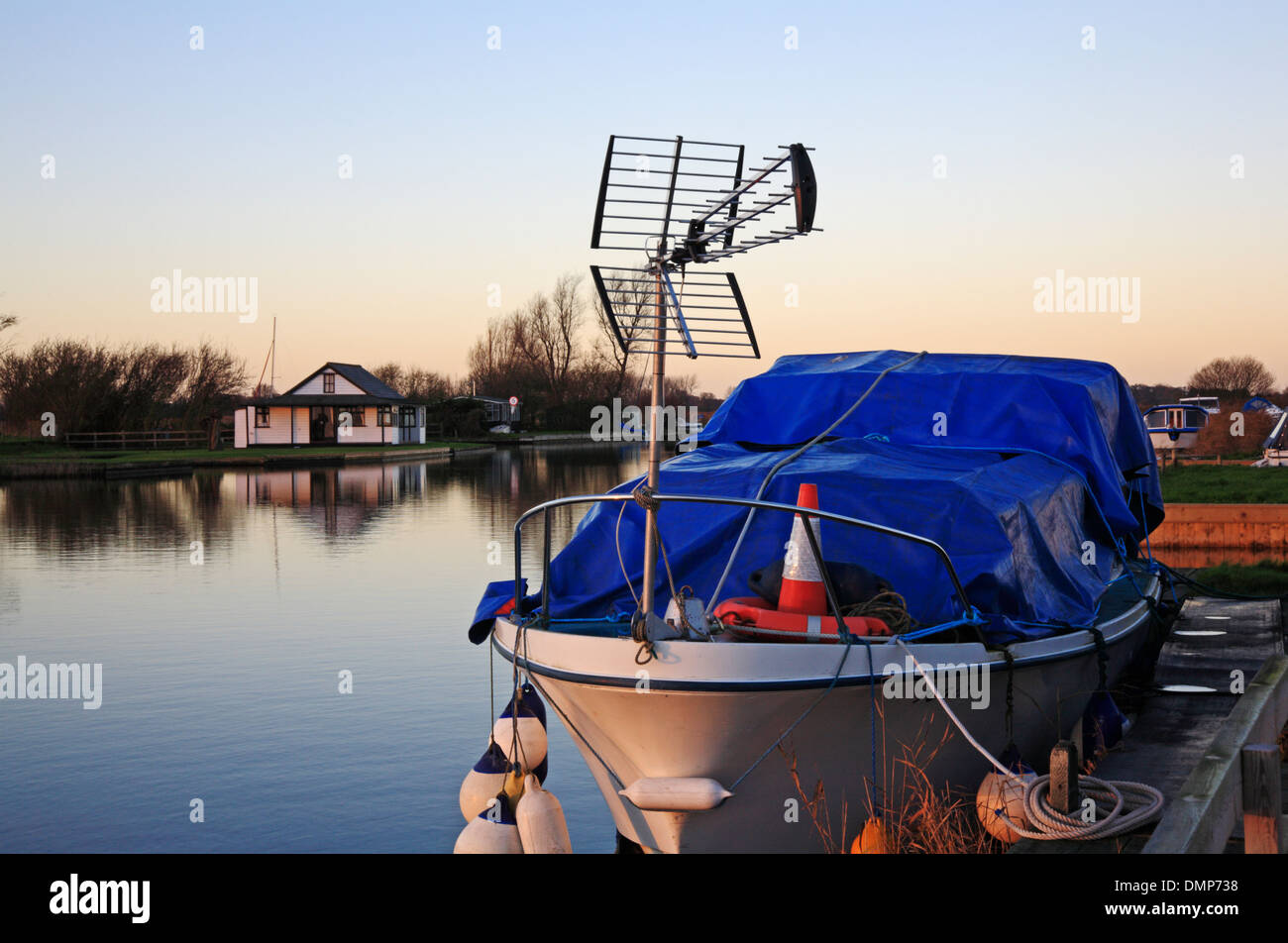 A Norfolk Broads cruiser with large television reception aerial. Stock Photo
