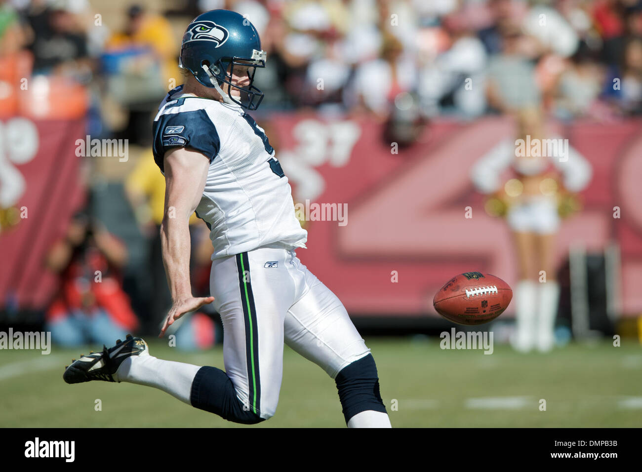 Seattle Seahawks punter Jon Ryan (9) bobbles the ball while running for 26  yards on a fake punt against the Los Angles Rams at CenturyLink Field in  Seattle, Washington on December 15