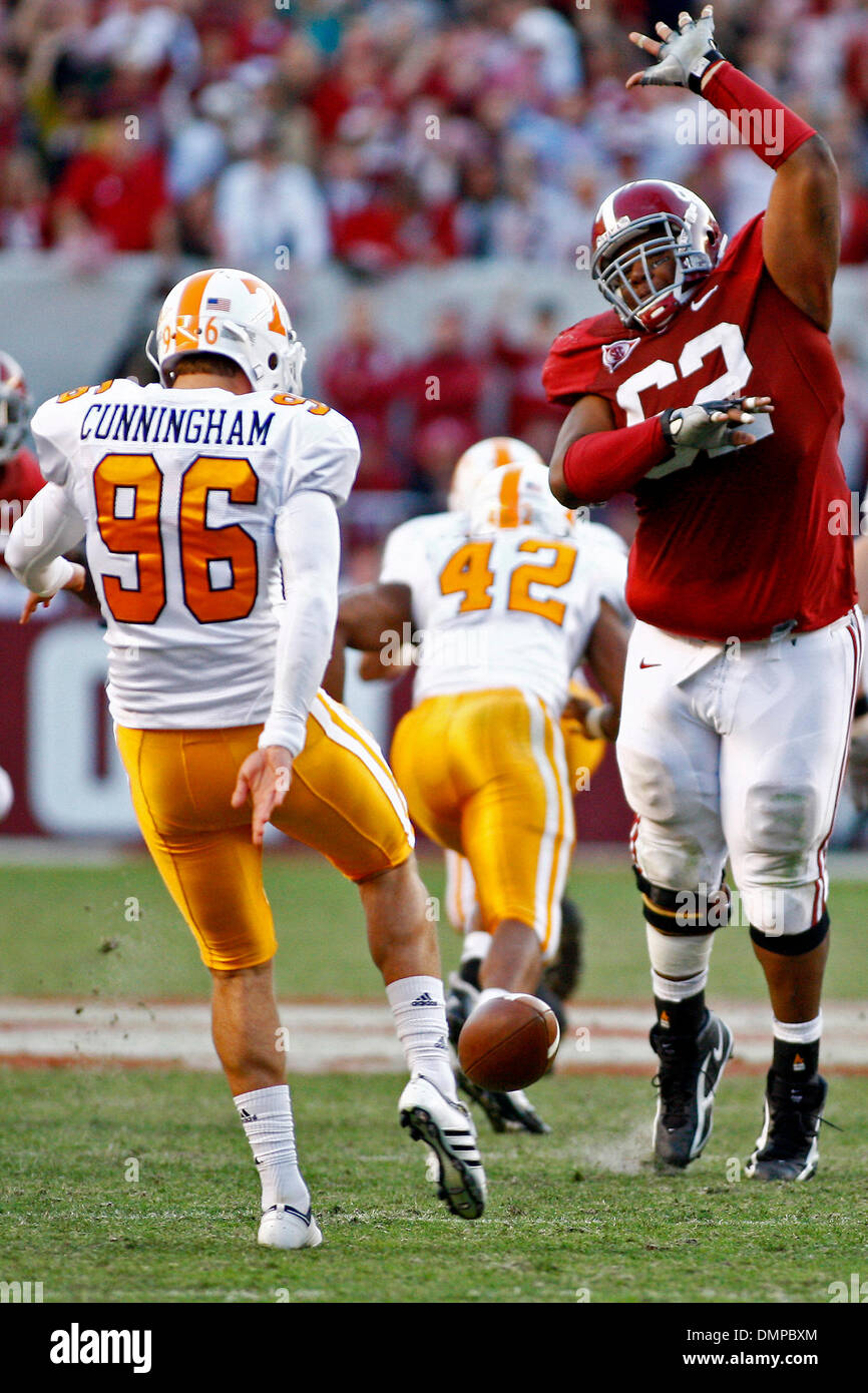 Oct. 24, 2009 - Tuscaloosa, Alabama, U.S - 24October2009: Tennessee punter Chad Cunningham (96) punts the ball as Alabama's Terrence Cody (62) closes in during the NCAA football game between the CRIMSON TIDE and the UNIVERSITY of TENNESSEE played at Bryant-Denny Stadium in Tuscaloosa, Alabama. The UNIVERSITY of ALABAMA beat the UNIVERSITY of TENNESSEE 12-10. (Credit Image: © Jason  Stock Photo
