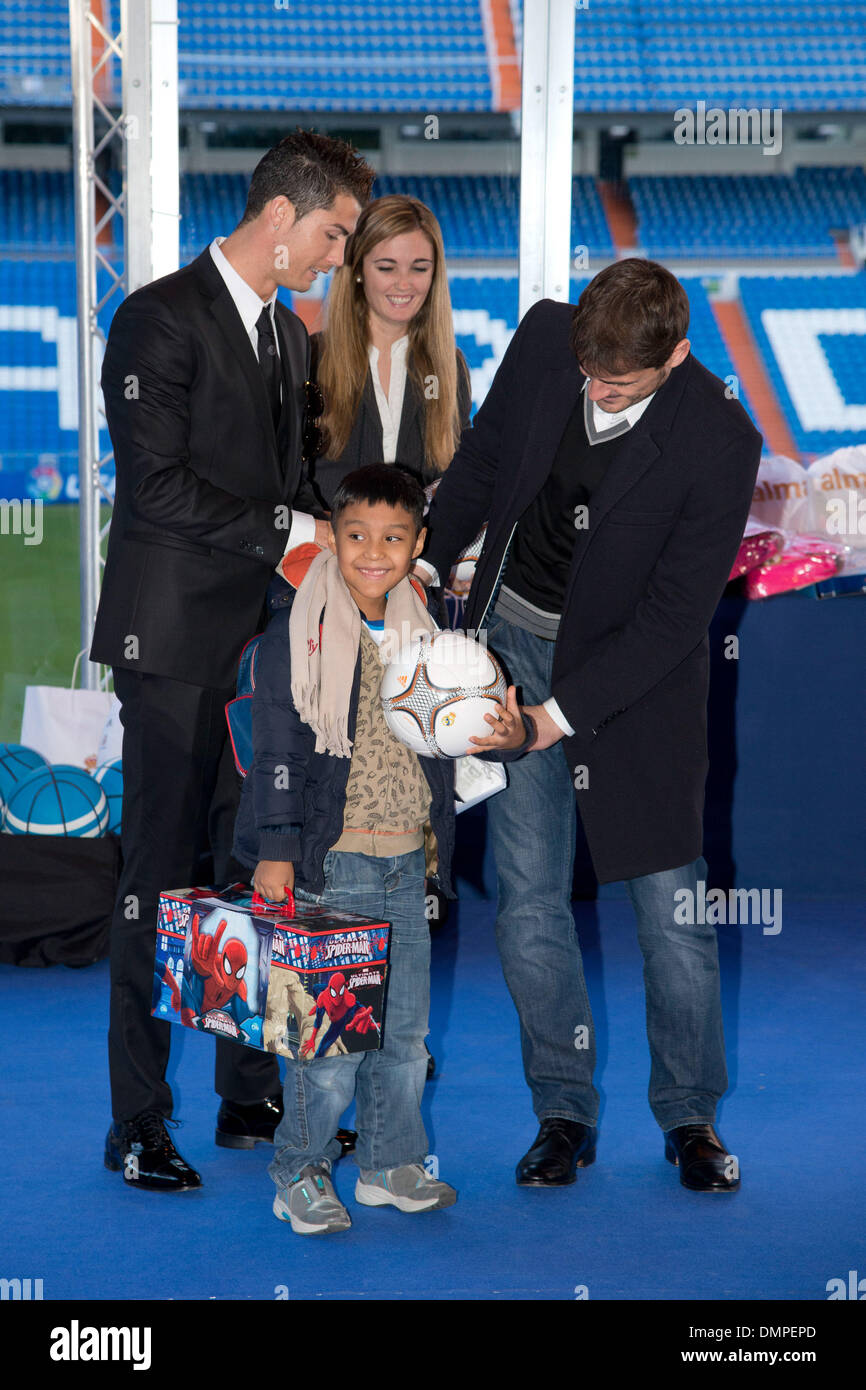 Madrid, Spain. 16th Dec, 2013. Football Players of Real Madrid Iker Casillas and Cristiano Ronaldo with the most disadvantaged children in the campaign ''At Christmas, no child without a gift.Photo: Oscar Gonzalez/NurPhoto Credit:  Oscar Gonzalez/NurPhoto/ZUMAPRESS.com/Alamy Live News Stock Photo