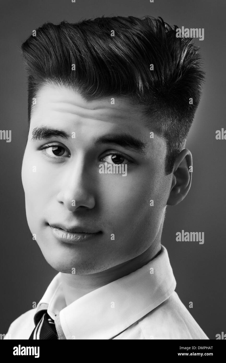 portrait of young man looking at camera Stock Photo - Alamy