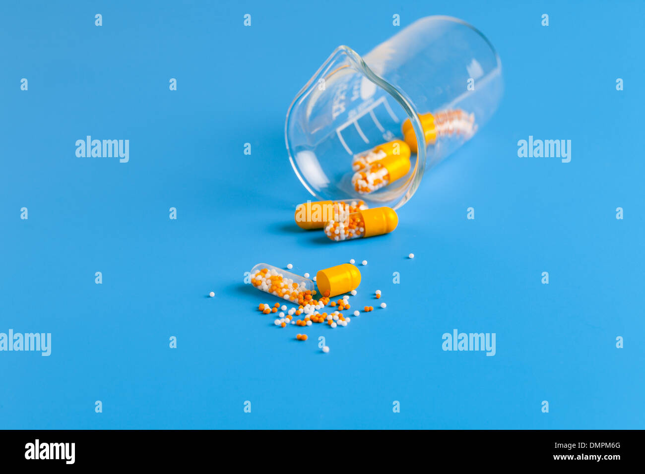 yellow capsules with vitamins Stock Photo