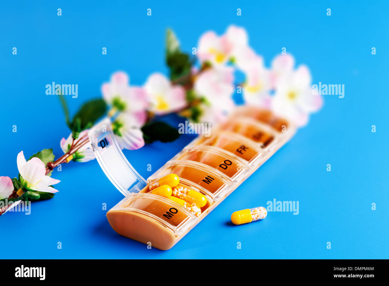 yellow capsules with vitamins Stock Photo