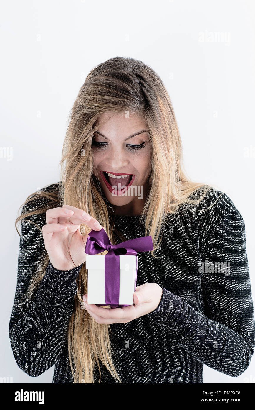 woman opening gift Stock Photo