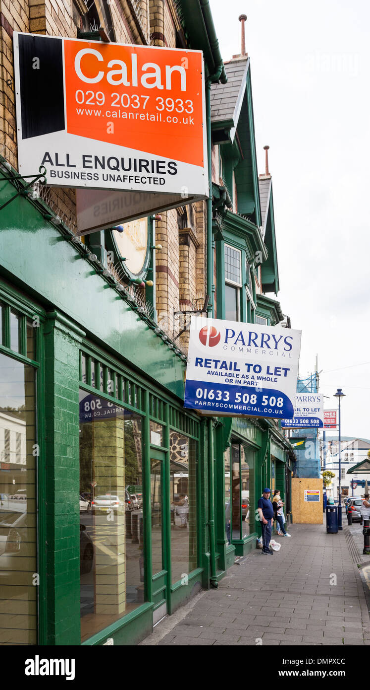 Row of shops in high street with to let and closed signs, Abergavenny, Wales, UK Stock Photo