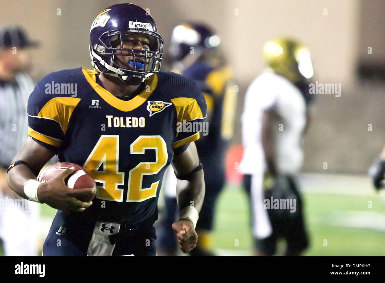 Toledo linebacker Archie Donald (42) carries the ball. University of ...