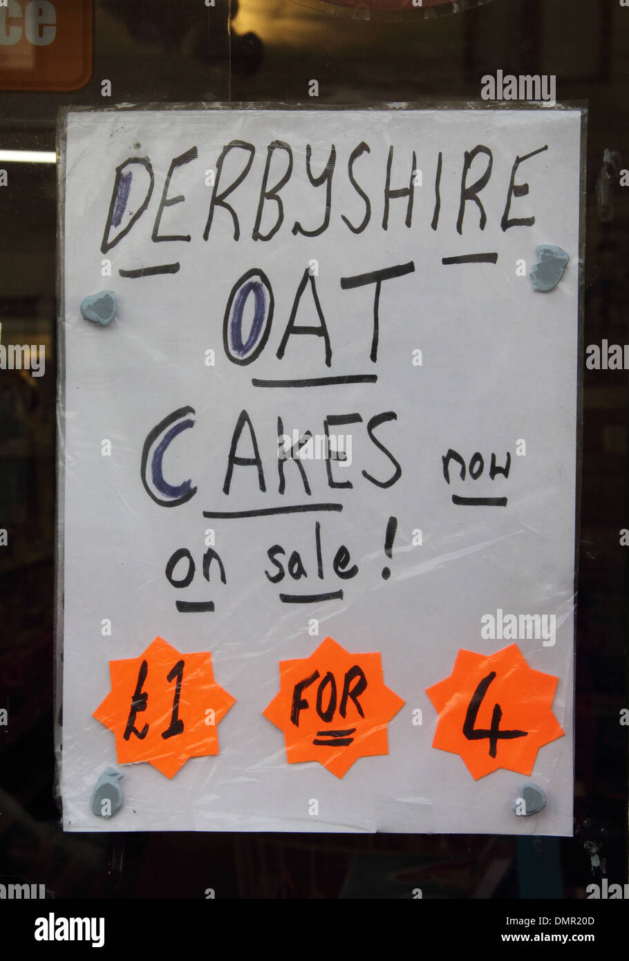 Derbyshire oatcakes for sale sign on village shop door Eyam, Peak District, Derbyshire Stock Photo