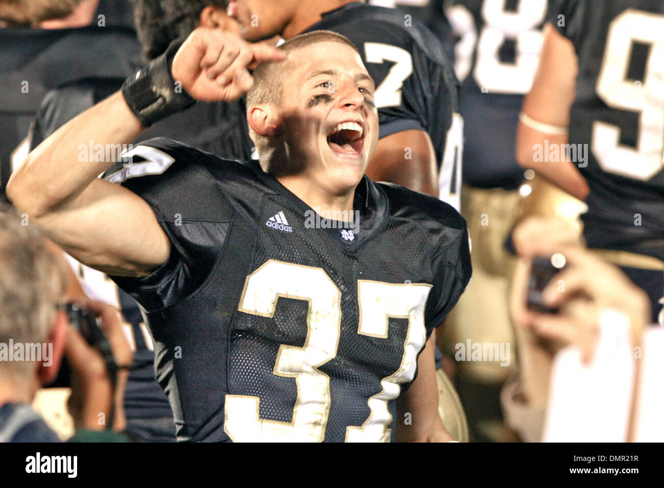 Notre Dame cornerback Mike Anello (10) celebrates after the game ...