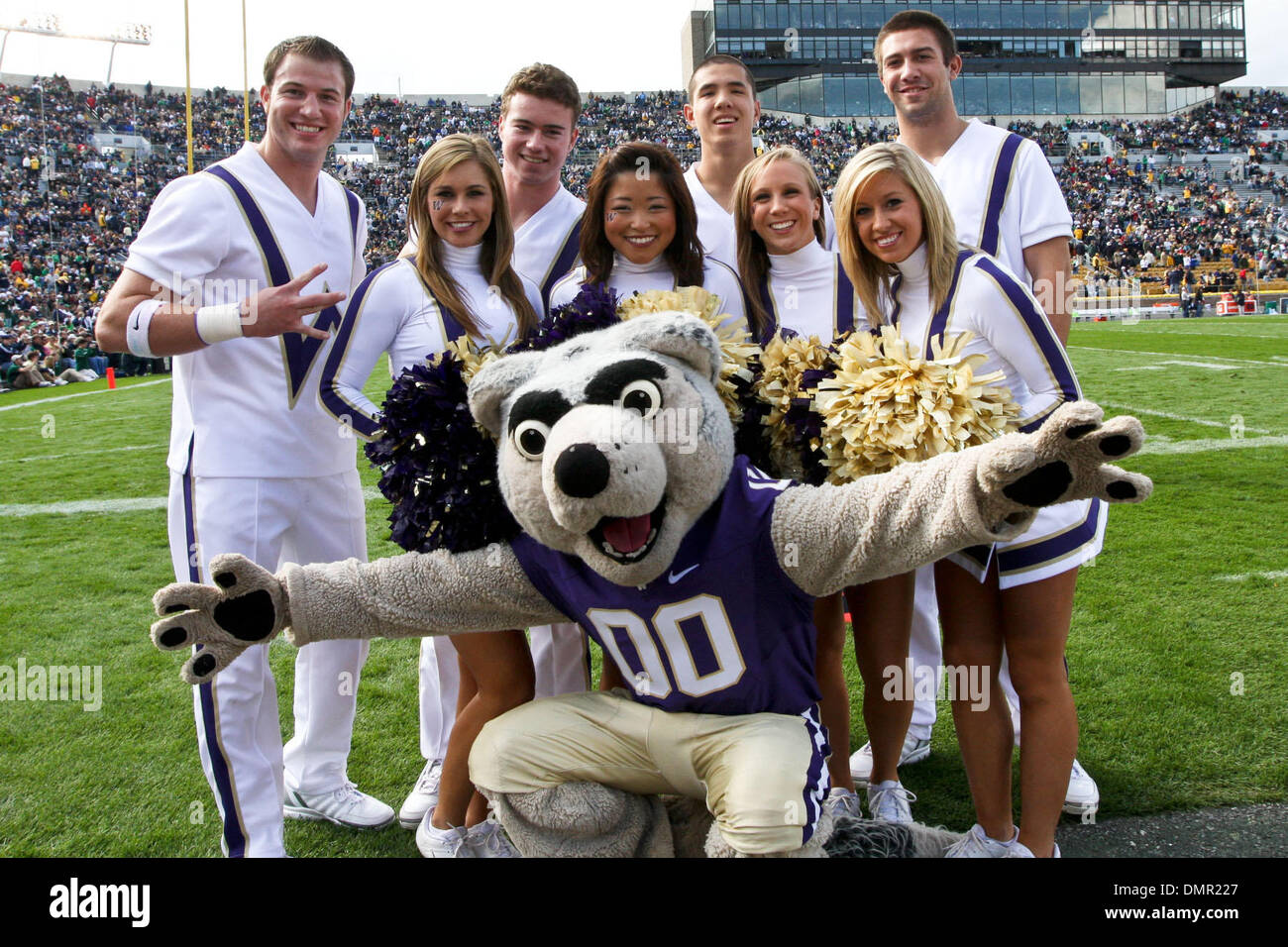 Notre Dame cheerleading squad and mascot practicing before