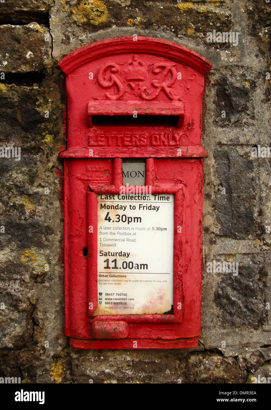 George VI post box built into stone wall in Grindlow, a hamlet in the heart of Derbyshire's Peak District, UK. Stock Photo