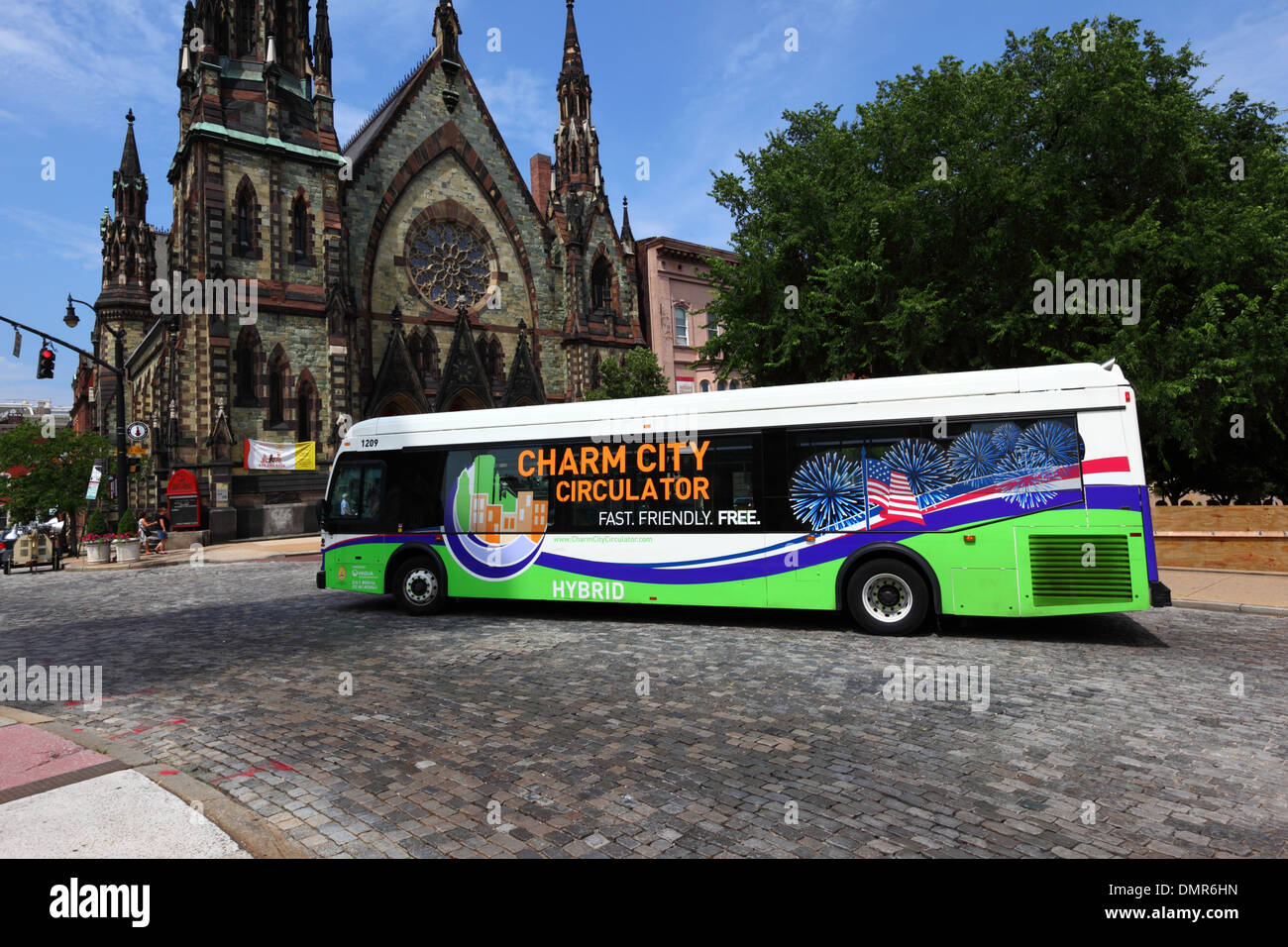 Charm City Circulator free public bus that uses hybrid fuel technology made by Orion International, Baltimore, Maryland, USA Stock Photo
