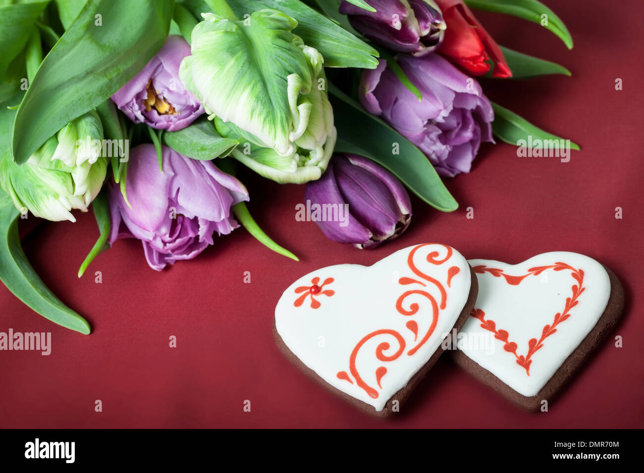 Gingerbread heart and tulips Stock Photo