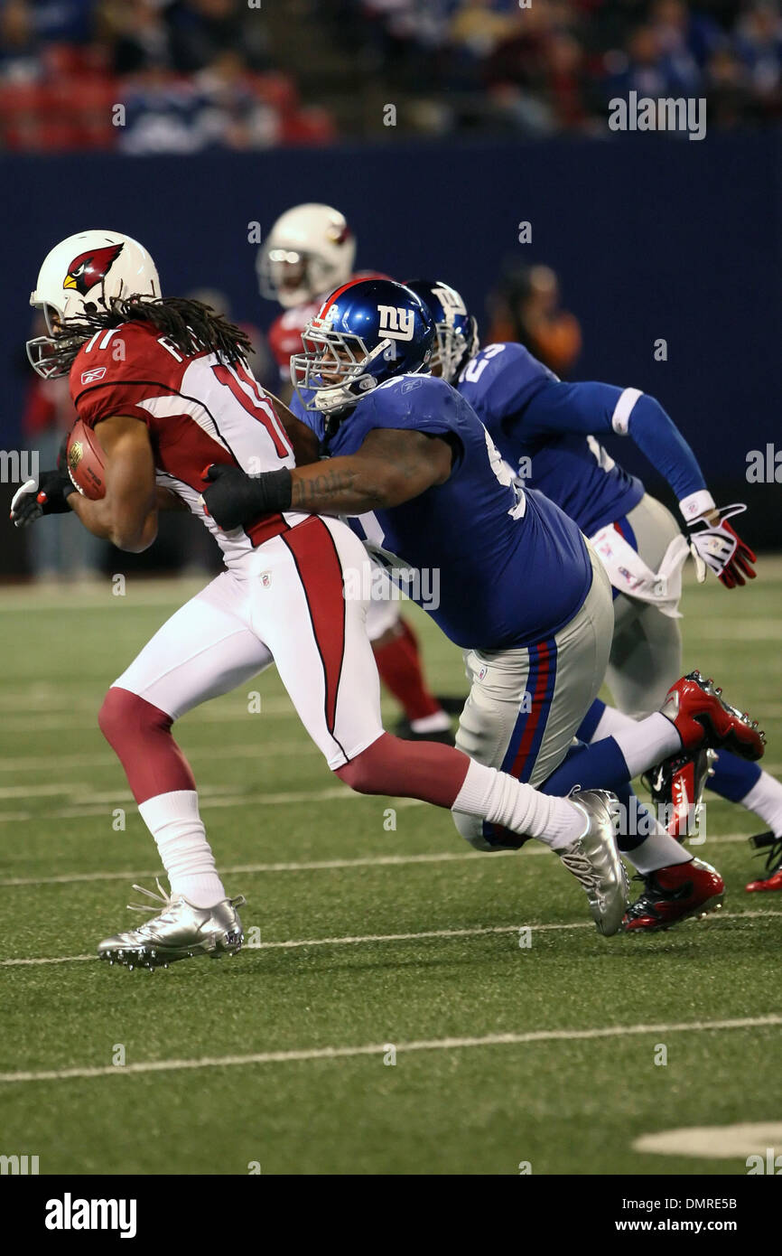 25  October 2009:   Arizona Cardinals #11 wide receiver Larry Fitzgerald tackled by  NY's #23 corner back Corey Webster. The Arizona Cardinals defeated the New York Giants 24-17 at Giants Stadium, East Rutherford, NJ. (Credit Image: © Anthony Gruppuso/Southcreek Global/ZUMApress.com) Stock Photo