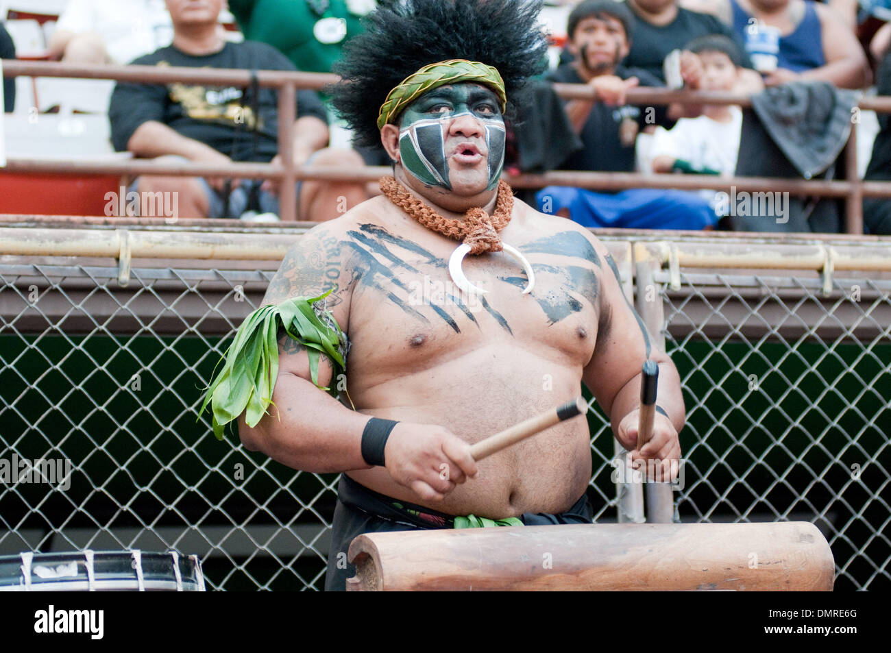 Hawaii mascot beats the drums during the first half in the game between