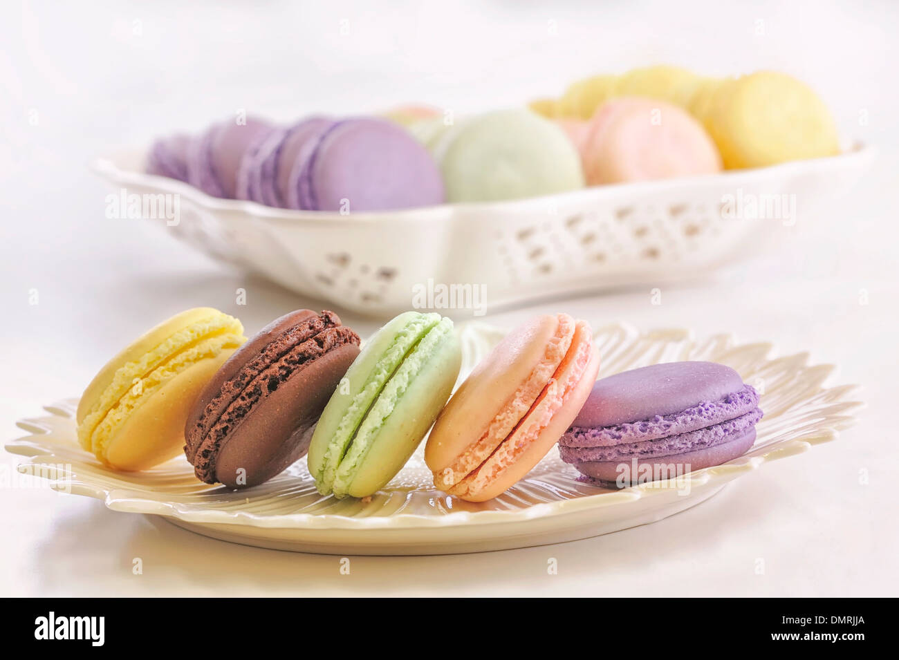 An assortment of cassis, citron, raspberry, chocolate and pistachio flavored macarons Stock Photo