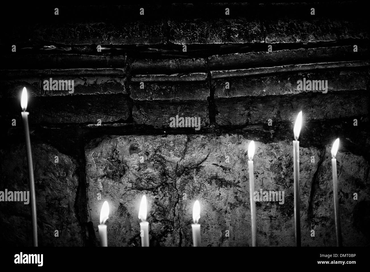 Prayer candles by the Aedicule in the Church of the Holy Sepulchre in Jerusalem. Stock Photo