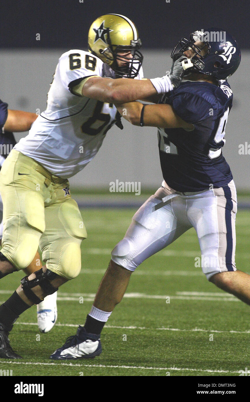 Rice defensive end Kramer Lucio (92) tries to get by Vanderbilt Reilly ...