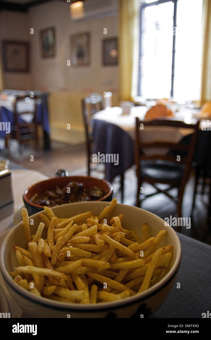 A bowl of fries served in a traditional Belgian restaurant, Ghent, Belgium Stock Photo