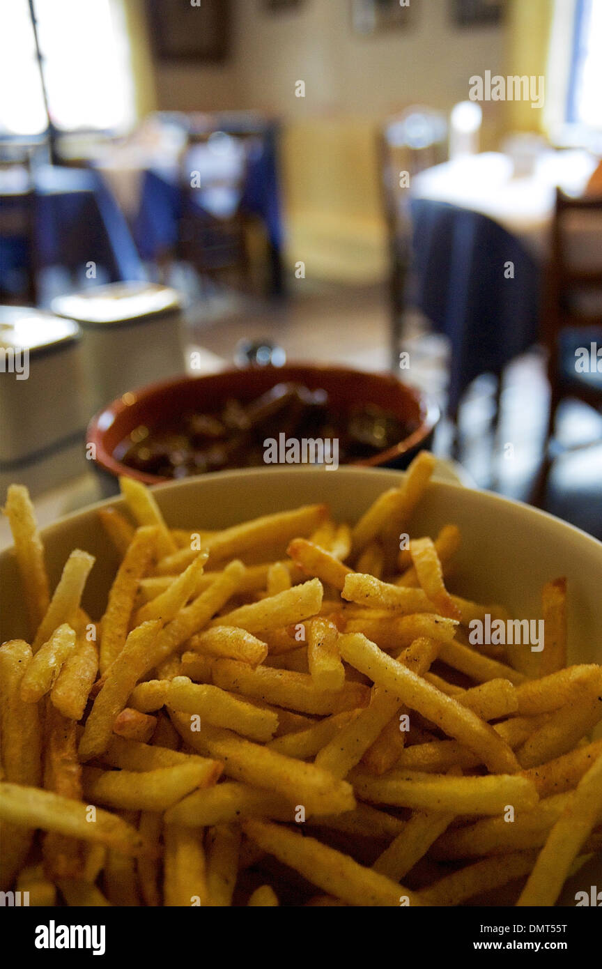 A bowl of fries served in a traditional Belgian restaurant, Ghent, Belgium Stock Photo